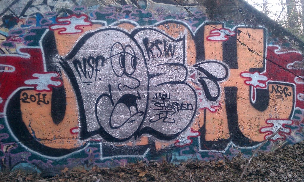 throw-up diss over graffiti piece 